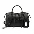 Gray handbag with drawstring details on a white background