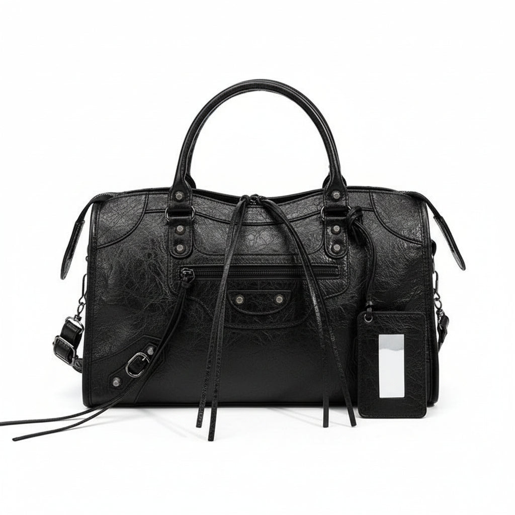 Gray handbag with drawstring details on a white background