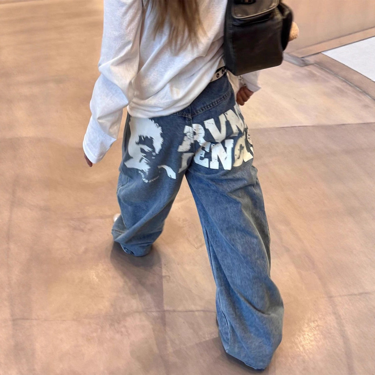 Blue graffiti letter jeans