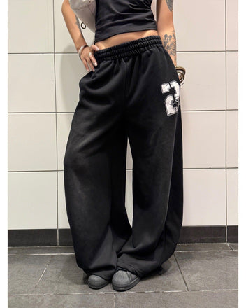 Black number print trousers