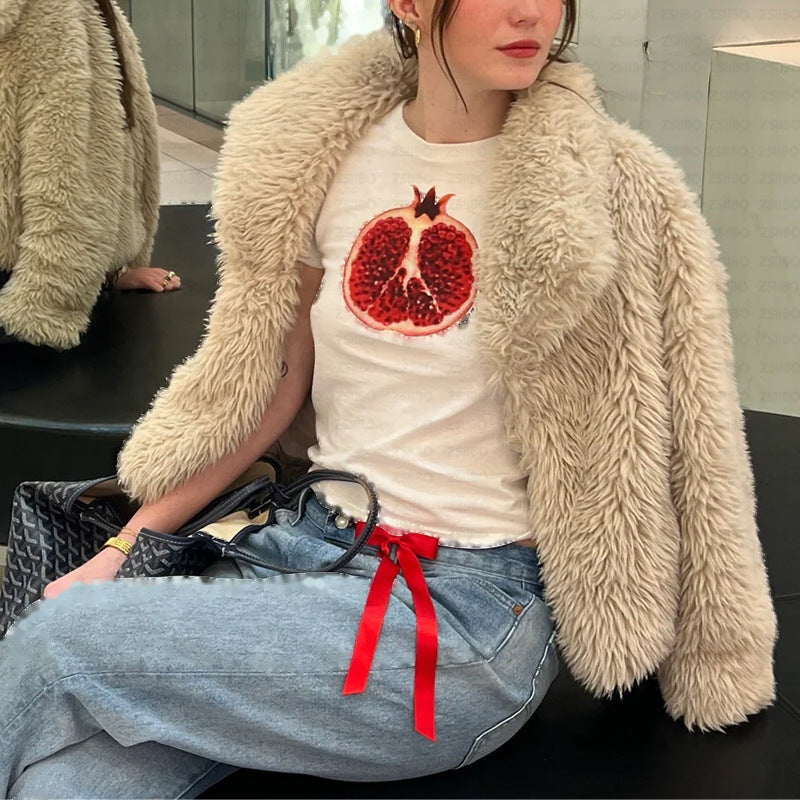 Pomegranate baby tee styled with a fur jacket